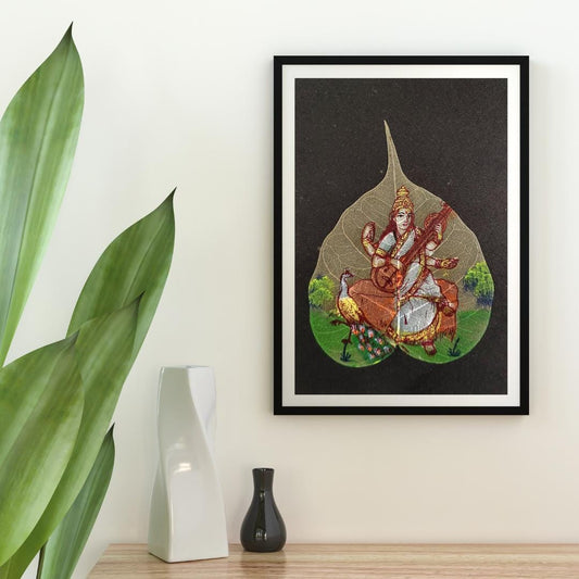 Indian Goddess Saraswati Handmade Leaf Painting - Pipal Leaf Art (9*6.5 inch)- Wall Decor (Unframed)